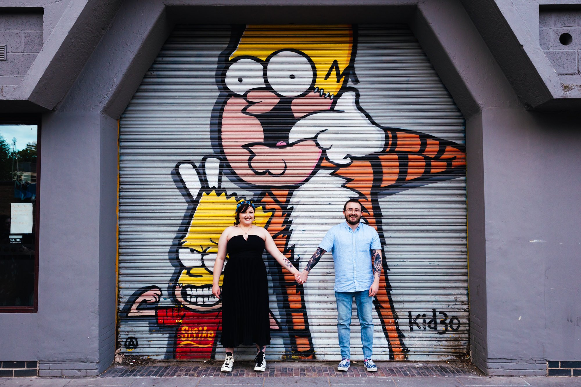 Small Wedding 29 Small Wedding- Couple stood in front of awesome graffiti in Nottingham Town Centre
