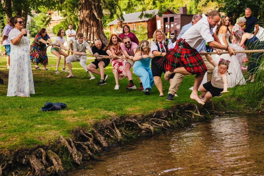 Wedding guests battling it out in a tug of war at a Nottingham wedding