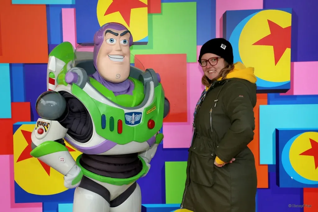 Kirsty posing next to Buzz Lightyear